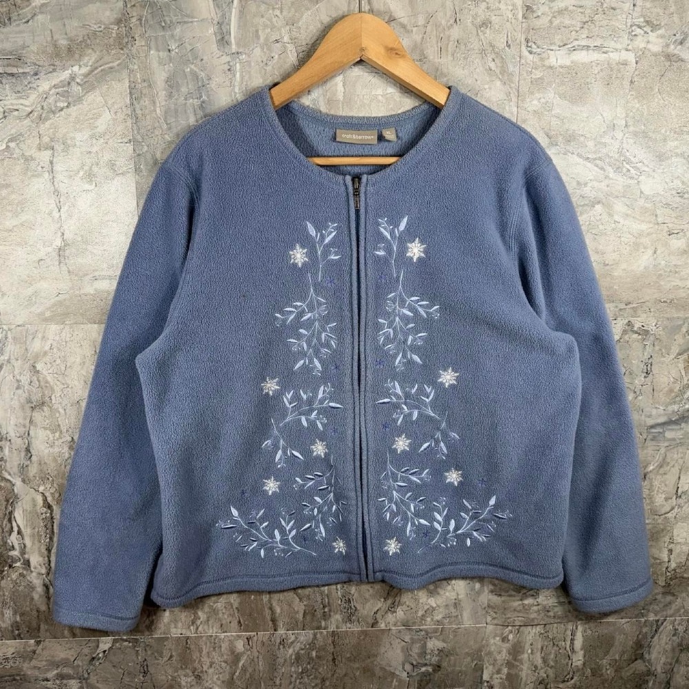 Croft & Barrow Blue Fleece Jacket with White Embroidered Floral Design
Size XL